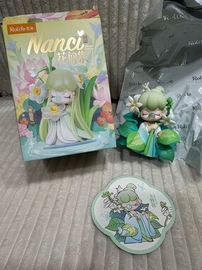 PLANTAIN LILY-  Nanci Flower Stories characterNew.Box opened to verify.Pretty!